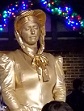 I found Golden Temptress working as a statue in Disney springs as well